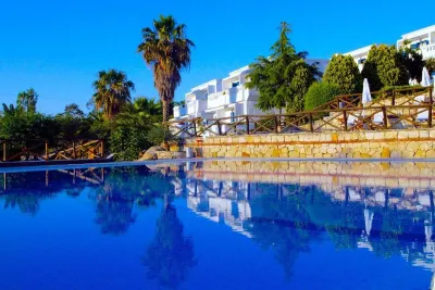 Agionissi Resort Hotels near Camping Delphini