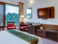 Amber Inn by Orion Hotels Hotels near ISKCON Temple