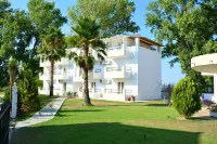 Cavos Beach House Hotels near Cavo D'Oro
