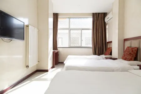 Jinxin Hotel (Chengbei Village Branch) Отели рядом с достопримечательностью «Jiulong Temple»