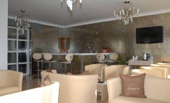 Kyknos de Luxe Suites & Rooms
