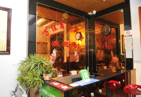 Guangshan Wanjia Business Hotel Отели рядом с достопримечательностью «Guandu River Scenic Area»