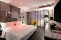 Orange Hotel (Dalian Qingniwaqiao Subway Station) - พร้อมระเบียง