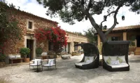 Finca Hotel Rural Es Turó فنادق في كامبوس