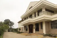Lia Hotel & Training Centre Hotels near Divine aqua water refill station