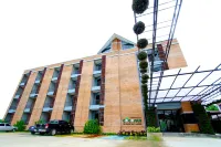The Coconut Hotel Hotels near Wat Si Phumma