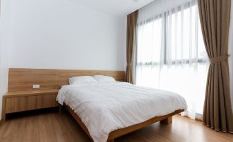 Quiet Hoang Quoc Viet Hotel & Apartment