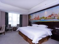维也纳国际酒店(广东凤岗汽车站店) - 豪华浪漫大床房
