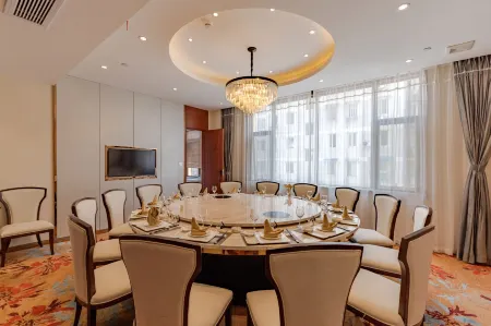 Yue Lan Wan Business Hotel Отели рядом с достопримечательностью «Wuhu University»