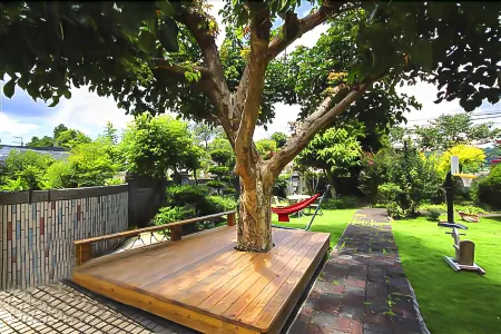 Garden Life Hostel Отели рядом с достопримечательностью «Zhangliancang Saxophone Memorial Hall»