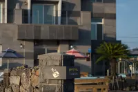 Jeju Flyjin House Pension Отели рядом с достопримечательностью «Пляж Гимнеон Сеонсеги»