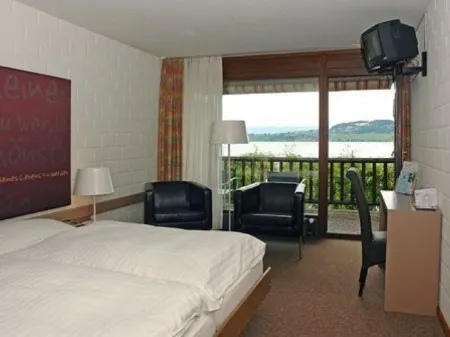 Hotel Bad Murtensee Отели в г. Муртен