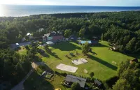 Roze Village Jūrnieka Ligzda Hotel di Perkone