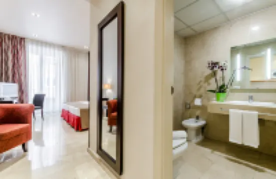 هوتل إيكسي سويتس 33