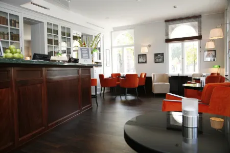 Hotel Brandenburger Tor Potsdam Отели рядом с достопримечательностью «Потсдамский университет»