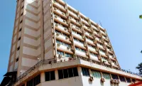 Hotel Poonja International Hotels near Mangalore Beach