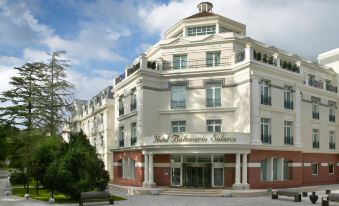 "a large white building with a sign that reads "" hotel belvedere "" prominently displayed on the front" at Castilla Termal Solares