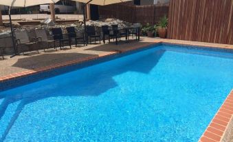 Top of the Town Motor Inn - Housity