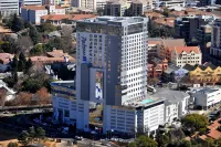 Radisson Blu Hotel Sandton, Johannesburg Hotels near Dragon City Water Park