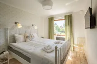 Lustigsgården Boutique Hotel فنادق في Tallberg