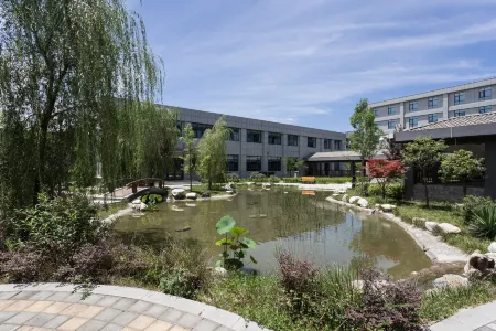 Nanshanyuan Hotel Отели рядом с достопримечательностью «Xi'an Mingde Institute of Technology»