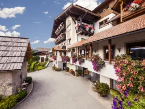Regitnig - 4 Sterne Hotel Und Chalets