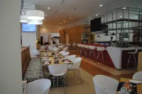 庫奧蒂特蘭嘉年華旅館 - 早餐