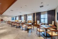 Huada Light Luxury Hotel - Balkon