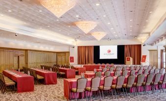 a large conference room with multiple tables and chairs arranged for a meeting or event at Slieve Donard