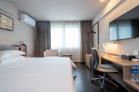 New East Asia Hotel (Xiamen International Airport) Отели рядом с достопримечательностью «Xiamen Botanical Garden»