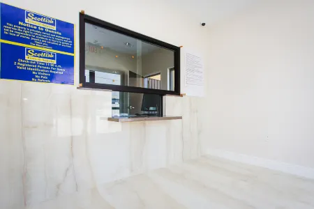 Scottish Inn & Suites Отели в г. Бейтаун