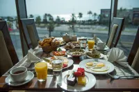Kuwait Grand Hotel Hoteles en Salmiya