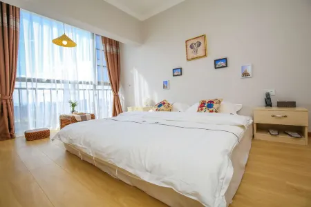 kunmingchiengmaihotel Отели рядом с достопримечательностью «Kunming University of Science and Technology Chenggong Campus Library»