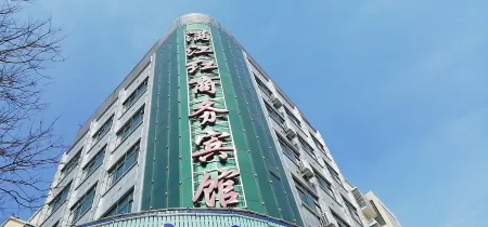 Luoshan Manjianghong Business Hotel Отели рядом с достопримечательностью «Dongzhai Crested Ibis Home Bird Photography Base»