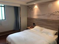 七橙酒店式公寓(广州华南理工大学店) - 橙光大床房