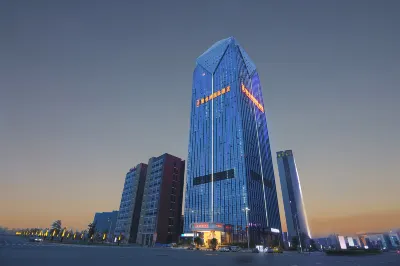 維也納國際酒店（遂寧健坤城店） 鄰近遂寧喜盈門卡百利藝術塗料高定館的酒店