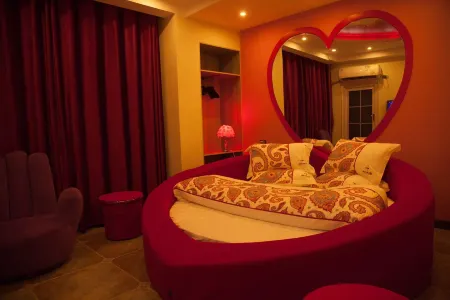 Jinping Weiai Theme Apartment Отели рядом с достопримечательностью «Chixiping Fengyu Bridge»