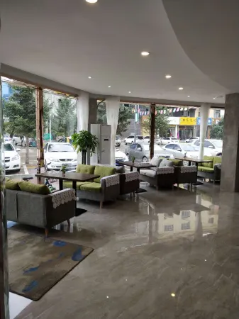 Xinyue Hotel Chain (Xiji Government Street) Отели в г. Сицзи