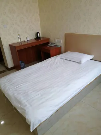 Qixia Guangtai Business Hotel Отели в г. Цися