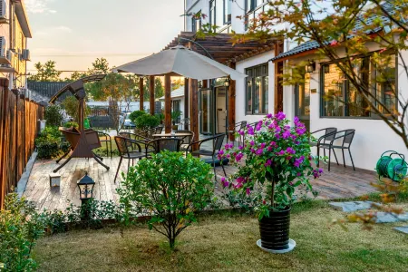 Shanghai Yishe Garden Homestay Отели рядом с достопримечательностью «Shanghai Village»