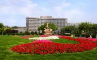 Yisuli Hotel (Dalian Hi-tech Wanda Plaza) Hotels near Dongbei University of Finance and Economics Gymnasium