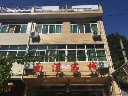 Mianxi Inn Отели рядом с достопримечательностью «Shiwei Peak»