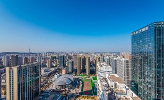 Wanda Gold Dragon Holiday Apartment - Housity