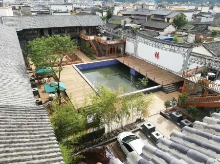 Jianchuan Lushi Inn Отели рядом с достопримечательностью «Jianchuan Old Town»