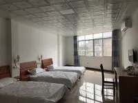 Daxin Xiangle Inn - Posadas