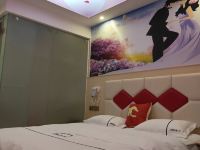 广州喜橙主题公寓 - 温馨浪漫水床房