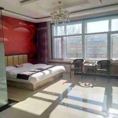 扎蘭屯家園賓館 Rooms