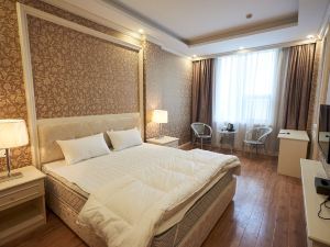 Xinhaohui Holiday Hotel (Xinzhou Hospital of Traditional Chinese Medicine Chengbei Industrial Park)