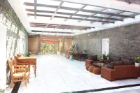 Jinghong Manzhelan Inn - Holiday Apartments