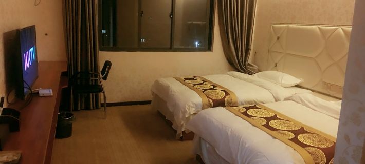 Jinlilai Hotel Hotel di Guiding